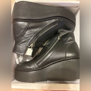 Steve Madden black platform boots